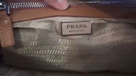 how can you tell if pradas are fake|how to identify prada purses.